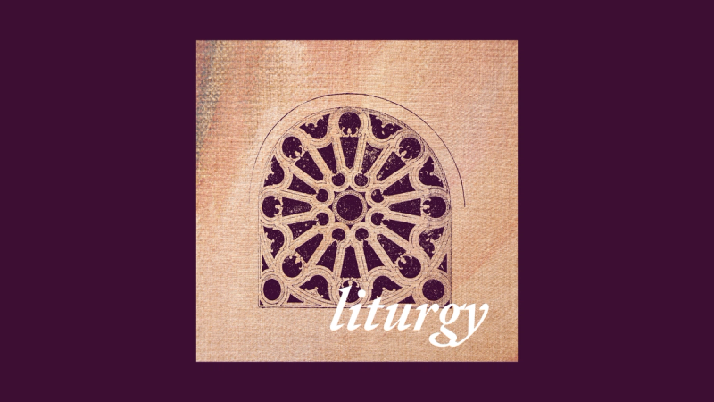 A cathedral rose window over a deep purple background.